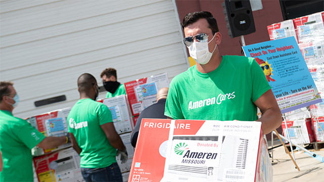 Ameren employees helping at a Cool Down Missouri event. 